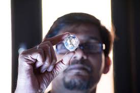 Young Diamond Merchant Is Looking At Diamond Stock Photo