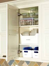 36 Inexpensive Kitchen Storage Ideas For A Tidy Kitchen And Cleaner Cabinets Tupperware Organizing Cabinets Organization Home Organization