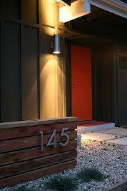 Although, they've recently started selling complete doors and we probably would have gone that route. Fireplace And Fence Modern Landscaping House Exterior Mid Century Exterior