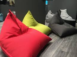 A bean bag chair is all in one: Cozy Floor Seating Options For Every Type Of Space Bean Bag Chair Room Color Design Bean Bag Living Room