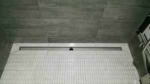 Shower Drain With The Tile Covered Grate Removed 52 Inches Long Tile Covers Shower Drain Installation
