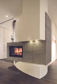 Kachelöfen in klassischer optik und mit moderner technik bieten einen hohem nutzwert und einen geringen brennstoffverbrauch. Naturton Design Ofen Aus Sudtirol Pohl Ofen Kachelofen Modern Grundofen Kamin