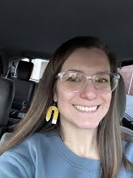 Ready for class? This little scholar is all ears!"