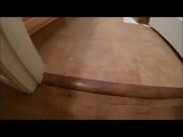 When we got to the front we decide to not cut out the step yet. How To Video On Installing Vinyl Plank Transition Strips From Ceramic Tile To Vinyl Plank Installing Vinyl Plank Flooring Vinyl Plank Flooring Diy Flooring