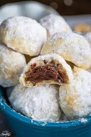 Nutella Stuffed Snowball Cookies With Nutella Unsalted Butter Powdered Sugar Vanilla All Pur Cookie Exchange Recipes Nutella Recipes Snowball Cookie Recipe