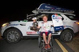Finding a cure for spinal cord injury. Wings For Life World Run Champion Im Rollstuhl