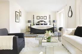 This bedroom has a sleigh bed that has dark wooden frames matching with the bedside table with a table lamp that brightens up the beige walls adorned transitional primary bedroom with a lovely gray tufted bed that matches the desk chair. 21 Stunning Primary Bedrooms With Couches Or Loveseats Home Stratosphere
