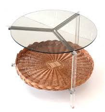 The natural fibers are woven over a wood frame in this round coffee table, making it an ideal piece for leisurely summer days. Italian Vintage Round Coffee Table Made Of Rattan 98771