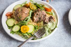Heat 3 tablespoons olive oil on medium high heat, in a large dutch oven or soup pot. One Skillet Lamb Meatballs And Couscous With Herby Whipped Feta Caroline Chambers