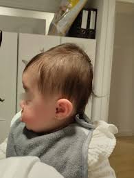 تحسين رأس الطفل الطويل من الخلف