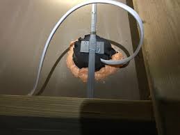 I see no compelling reason to leave that type of attic hatch light fixture in place. Attic Insulation Swedesboro Nj Air Sealing And Insulation Project This Is A Light Fixture Junction Box