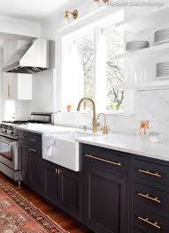 Kitchen With Black Lower Cabinets White Marble Countertops White Floating Shelves Farmhouse Si Kitchen Decor Inspiration Kitchen Design Kitchen Inspirations