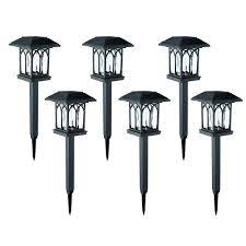 These black solar led pathway outdoor lights these black solar led pathway outdoor lights feature elegant ribbed lenses for a beautiful lighting effect on your walkway. Hampton Bay 10 Lumen Solar Led Black Landscape Pathway Light 6 Pack The Home Depot Canada