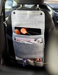A Felt Hanging Organiser From Ikea Tied To The Back Of A Car Seat With Space For Markers Coloring B Car Organization Diy Car Seat Organizer Hanging Organizer