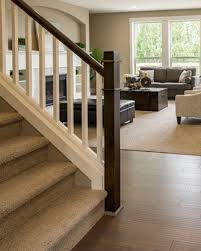 The white trim on dark blue really accents the architectural features. Stair Handrail
