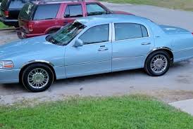 Image result for Light Ice Blue 2005 Town Car