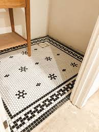 In the middle of our 1950's bathroom remodel. Farmhouse Half Bath Part 1 Penny Tile Historical Floor Small Town Farmhouse