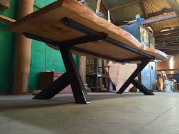 Underside Of The Slab Table With Complete View Of Unique Steel Base Wood Slab Table Slab Dining Tables Wood Slab Dining Table