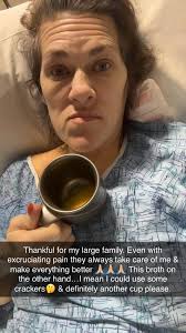 Should I page my surgeon about vomiting bile after ER visit?