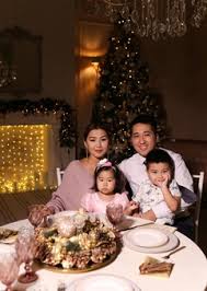 We may earn commission from the links on this page. Premium Photo Happy Christmas Dinner Asian Family With Children Smiling By The Fireplace And Christmas Tree