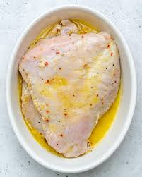 Wearing rubber gloves, remove the turkey from the marinade and wipe off some of the clinging garlic and spices. Easy Oven Roasted Maple Turkey Breast Healthy Fitness Meals