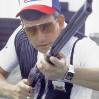 SGT 1ST Class Alger Mullins stands ready to bring his shotgun to his  shoulder the moment a target is thrown. Mullins won a silver medal in the  individual skeet shooting category and joined another soldier, SSGT Matthew  Dryke, to win a gold medal in the te ...