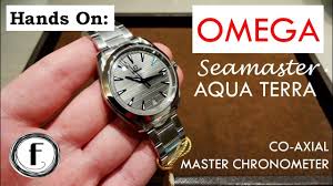 It has a round face with a brushed finish and an analog display. Omega Seamaster Aqua Terra 150 M Co Axial Master Chronometer In 41mm Hands On Youtube