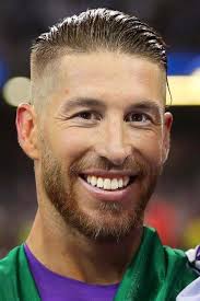 Sergio ramos of real madrid celebrates with the uefa champions league trophy following his sides victory in sergio ramos of real madrid during the uefa champions league match between roma and real madrid. The Compilation Of The Best Sergio Ramos Haircut Styles Menshaircuts