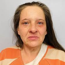 Georgia woman accused of killing fiancé, living with the body