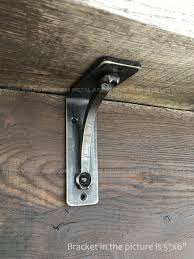 Decorative and functional iron corbels and brackets are one of the simplest ways to add a touch of decadent detail to your living space. Buy Custom Shelf Bracket Metal Hand Forged Shelf Bracket Kitchen Shelving Corbels Made To Order From Metal Art Studio Dmitri Volkov Custommade Com