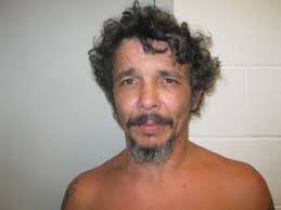 Shirtless man trespasses