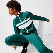 Survêtement lacoste blanc noir vert fluo taché. Survetements Homme Joggings Lacoste