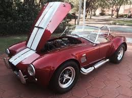 Image result for Rosso Chiaro 1967 AC Cars