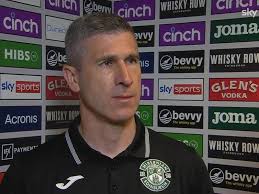 Aberdeen caretaker boss Peter Leven shares his delight with 16-year-old  Fletcher Boyd, who came off the bench to score
