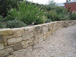 Australian architecture stone cladding garden design native garden stone houses home and garden stone supplier building a house sandstone wall. 20 Incredible Home Landscaping Design With Gravel To Enhance The Home Beautiful Natural Stone Retaining Wall Stone Retaining Wall Landscaping Retaining Walls