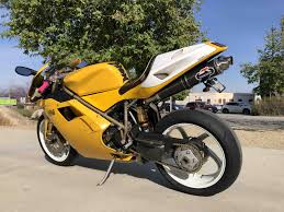 Image result for Nuget Yellow 1999 Motorcycle
