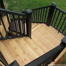 Black Railing With A Cedar Boards Inspires A Modern Look For A Classic Deck Design 7 Deck Rail Ideas For Your Ceda Outdoor Stairs Exterior Stairs Cedar Deck