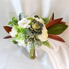 We have the ultimate fake flower and greenery wedding decorations cheap! Fun Forest Theme Bouquet It Never Dies Display After The Wedding City Flowers Bridal Bouquet Flower Designs