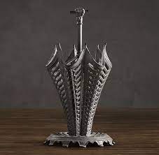 The umbrella is very stylish with silver tips on corners and sunbrella canopy. Collection Of Goods From Restoration Hardware Oen Victorian Irons Umbrella Stand Office Furniture Arrangement