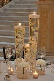 Submerged Orchid Centerpiece With Floating Candles Classic Collection Trio Wh Elegant Wedding Centerpiece Wedding Centerpieces White Wedding Centerpieces