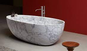 Freestanding carrara marble bathtub carved from a solid natural block of marble. Italian Marble Bathtub Novocom Top