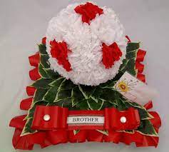 Light red carnations represent admiration, while dark red denote deep love and affection. Football Funeral Or Memorial Tribute Silk Flowers Silky Bouquets Ltd