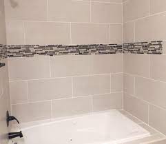 Arrange these tiles on a diagonal to make the bathroom appear larger. 12x24 Tile Wall Novocom Top