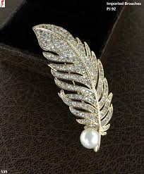 feather brooch