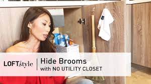 Keep brooms, mops and dusters off the floor and out of the way with a handy wall mount. 09 How To Hide Brooms With No Utility Closet Loftstyle Youtube