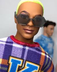 New Ken “K” Plaid Clothing Pack. Again, I'm showing you what is included in  the fashion pack only. This pack includes the “K” plaid textured knit  sweatshirt, matching lightweight woven plaid shorts,