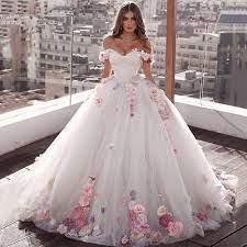 From simple and modern to rustic and whimsical, monochromatic white bouquets. Pink Flower Ball Gown Wedding Dress Elsi John