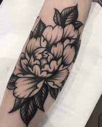 Another popular choice is the lotus tattoo. Flower Traditional Style Black And White Tattoo Gianmarco Celli Black Blacktattoocov White Tattoo Traditional Black Tattoo Black And White Flower Tattoo