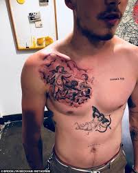 Brooklyn Beckham Adds To Angel Tattoo That Looks Similar To David S Daily Mail Online