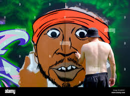 Graffiti artist painting hi-res stock photography and images